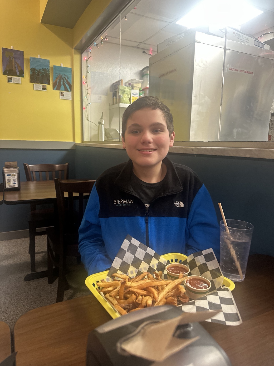 James smiling at the table at Omar’s Bistro in downtown Lexington.