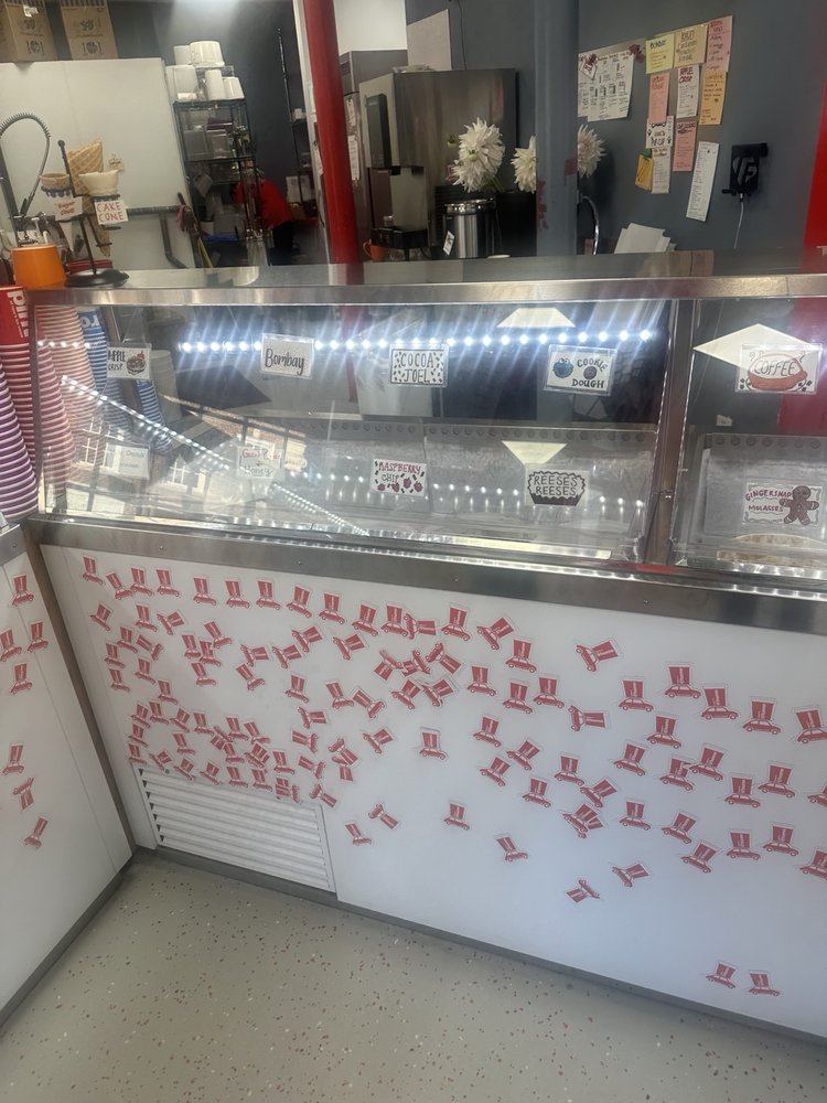 Photograph of another view of the ice cream display case and counter