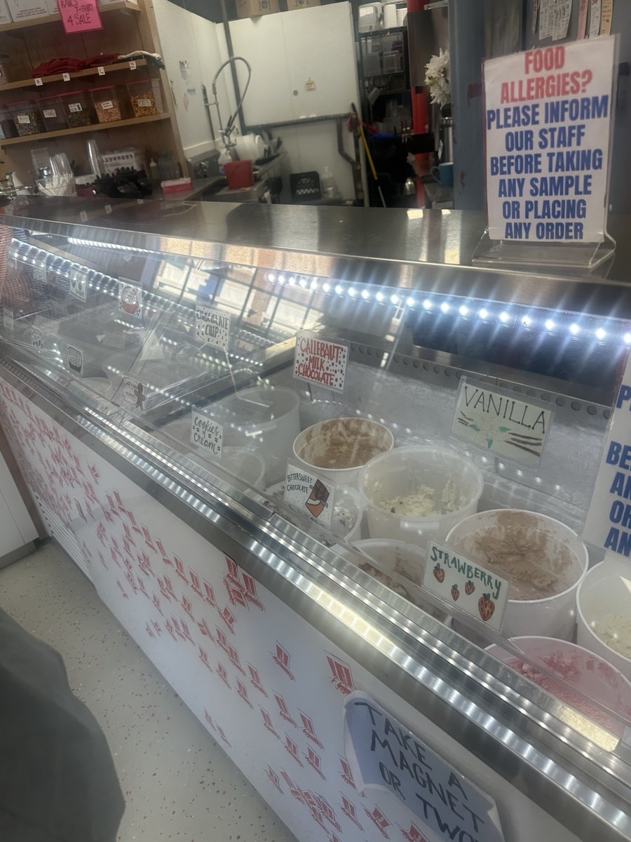 Original phone photograph of labeled ice cream tubs behind the Rancatore's counter