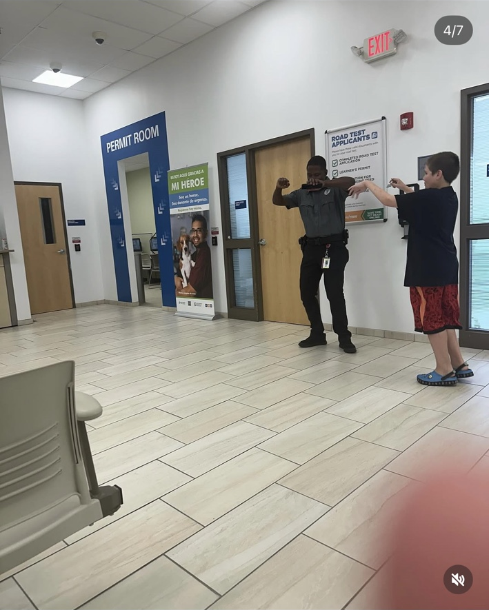 James reaches both arms forward while the guard dances a few feet away.